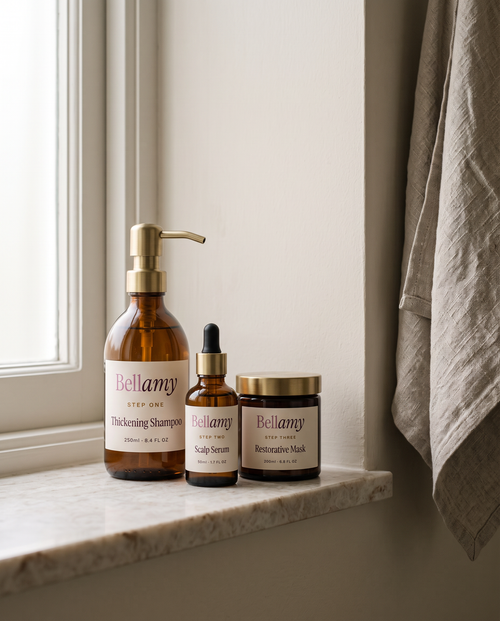 The Bellamy system on a marble bathroom shelf in morning light